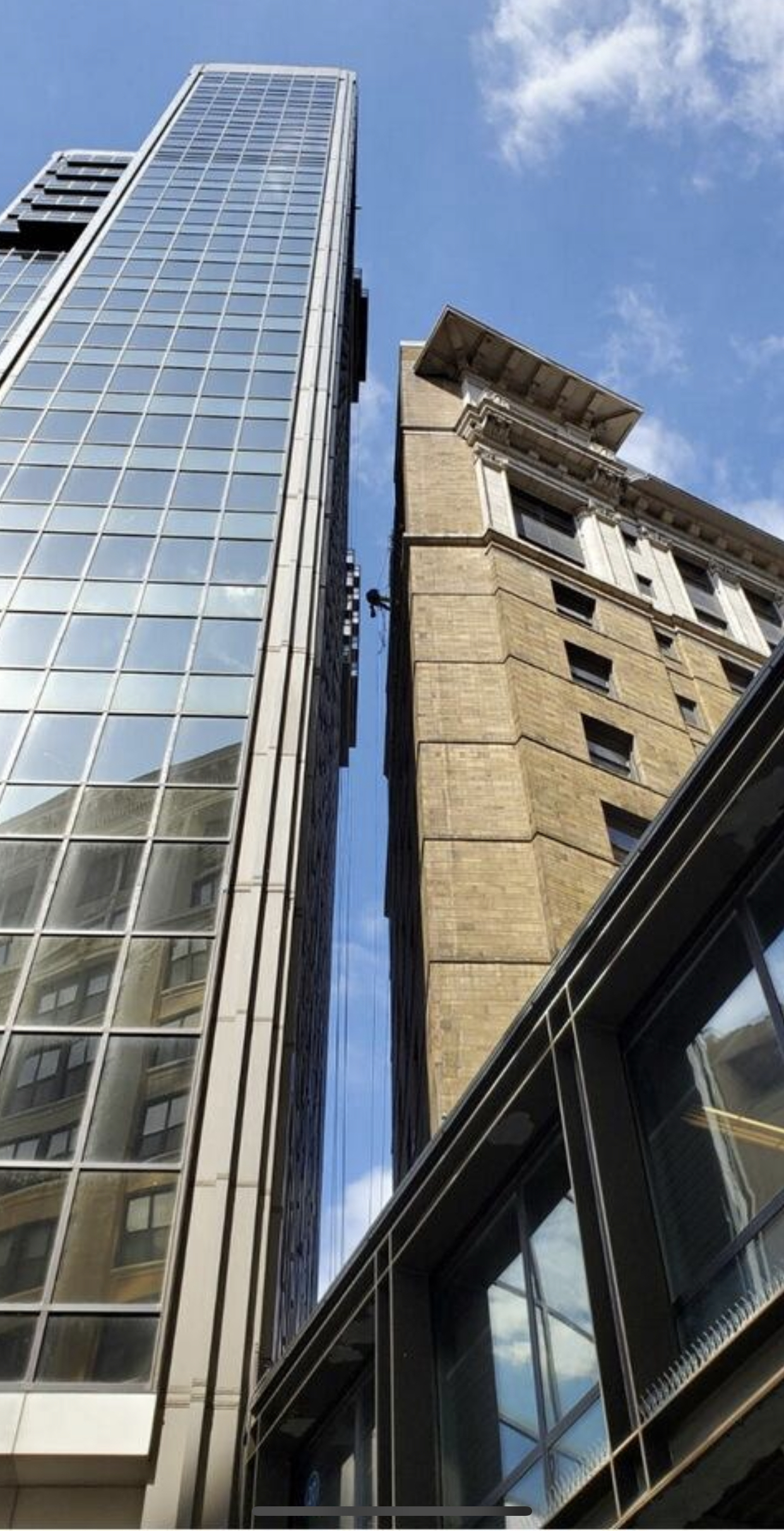 Rope access technician working on elevated structure
